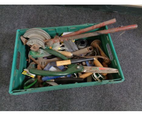 A plastic crate of a large quantity of hand and gardening tools, pipe bender etc 