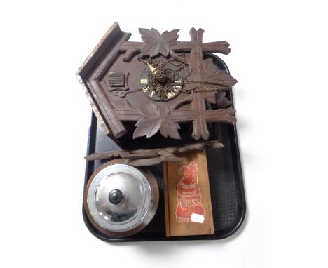 A tray of wooden tobacco caddy, boxwood chess pieces, together with a Black Forest style cuckoo clock 