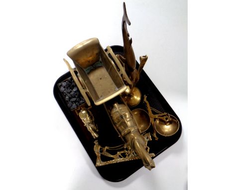 A tray containing assorted brass ware to include horse and cart figures, balance scales, dolphin etc 