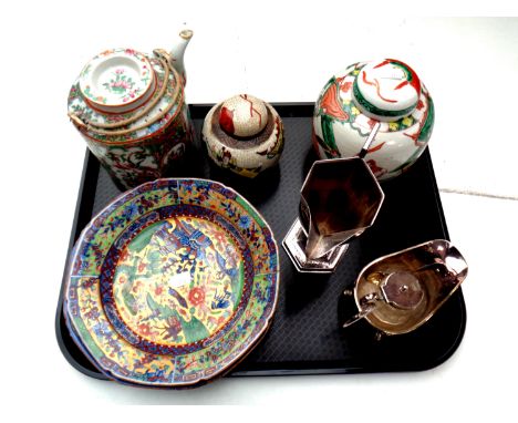 A tray containing 20th century oriental wares to include famille rose teapot with wicker handle, ginger jars and bowls, toget