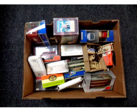 A box containing a quantity of boxed die cast vehicles to include Corgi trams and Parcel Force delivery van, exclusive first 