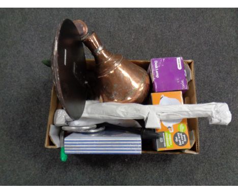 A box containing miscellany to include eastern copper urn, cast iron rabbit door stop, desk lamp etc 