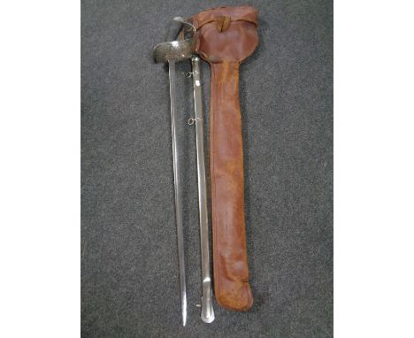 A First World War 1912 pattern cavalry sword in scabbard with outer leather cover