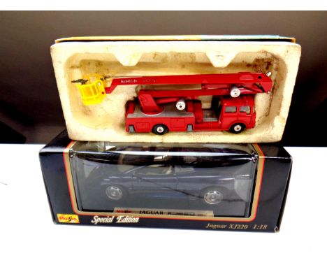 A boxed Corgi 1127 Simon Snorkel Fire Engine, together with a Maisto special edition Jaguar XJ220 1:18 scale (both boxed) 