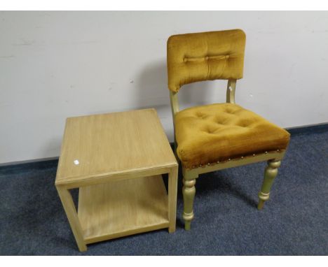 A painted bedroom chair upholstered in a gold button button dralon together with a painted two tier occasional table  