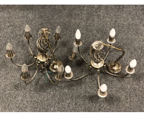 A pair of antique brass finish six-branch light fittings (2)