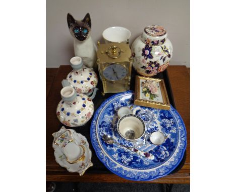 A tray of carriage clock and assorted ceramics to include Royal Crown Derby miniature mug and teacup, Capodimonte relief plaq