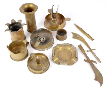 Three framed diagrams of ordnance components, showing sectioned views of fuzes, a complete shell, and a cartridge; together w