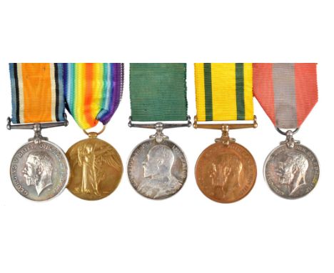 A small collection of medals to the Wiltshire Regiment, comprising: Volunteer Long Service Medal, Edward VII (5735 CPL. H.H. 