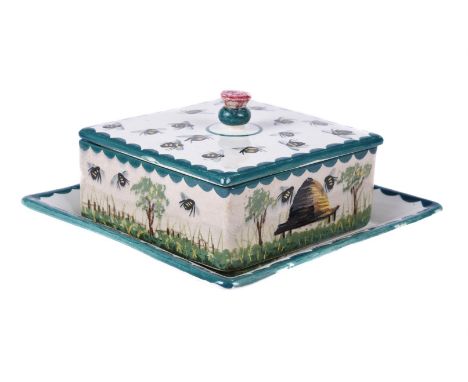 A Wemyss pottery honey box, cover and stand, first quarter 20th century, typically painted with bees and a skep, green script