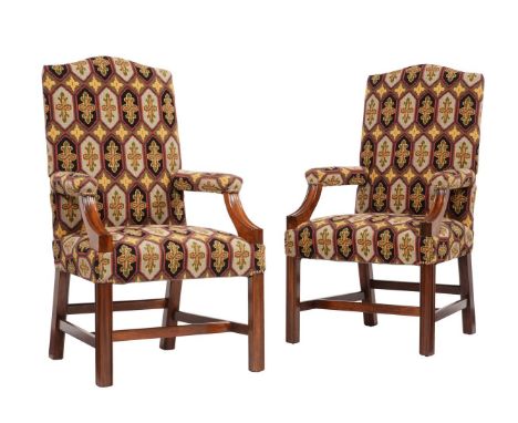 A pair of mahogany and tapestry upholstered open armchairs in George III style, second half 20th century, of Gainsborough typ