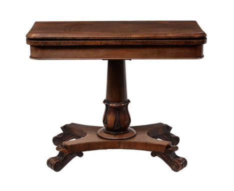 Y A George IV rosewood card table, circa 1830, the folding top enclosing a circular inset playing surface, above a turned pil