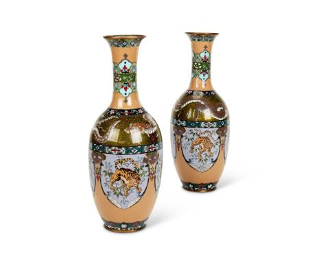 A pair of Japanese cloisonné slender baluster vases, Meiji period, the shoulders with dragons above a band of alternating pan