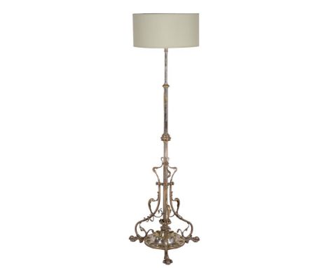 W.A.S. Benson (1854-1924) an Arts and Crafts silvered standard lamp, late 19th century, the iron base stamped with serial num