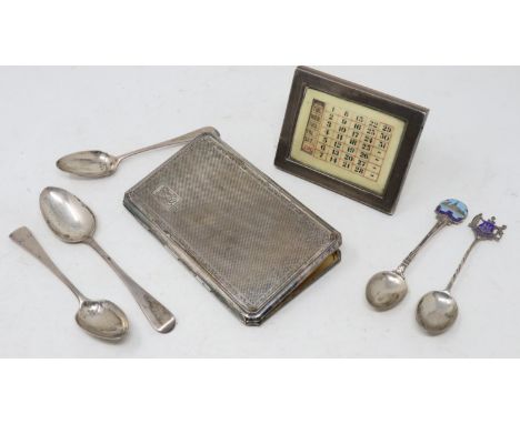 Hallmarked silver perpetual calendar, an engine turned white metal cigarette case, three Georgian silver tea spoons and two o