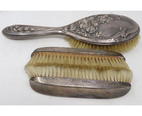 Three hallmarked silver backed brushes. UK P&amp;P Group 1 (£16+VAT for the first lot and £2+VAT for subsequent lots) 