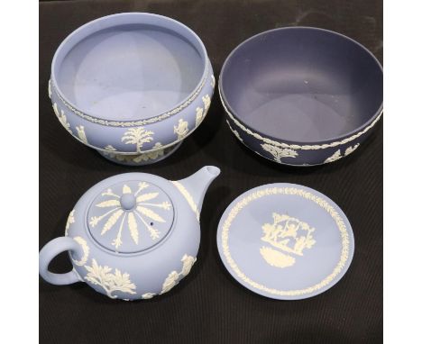 Two Wedgwood blue Jasperware footed bowls, a teapot and a plate, largest D: 20 cm, small crack to teapot. UK P&amp;P Group 3 