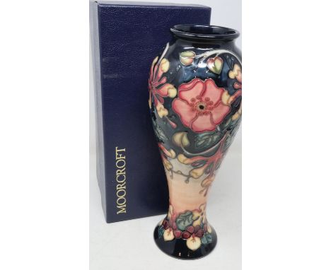 Blue ground Moorcroft vase in the Oberon pattern, signed WM to base, no cracks or chips, H: 28 cm, boxed. UK P&amp;P Group 2 