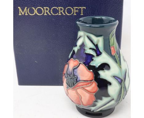 Green ground Moorcroft diminutive vase in the Poppy pattern, no cracks or chips, H: 11 cm, boxed. UK P&amp;P Group 1 (£16+VAT