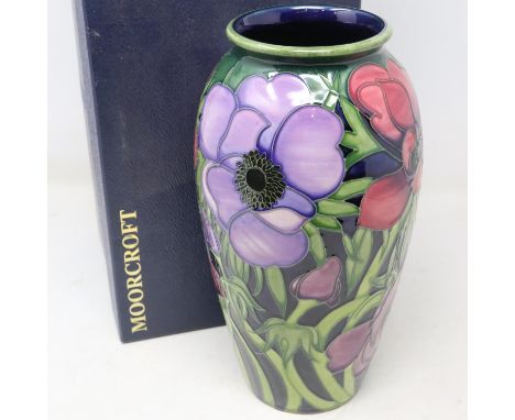 Large blue ground Moorcroft vase in the Anemone pattern, no cracks or chips, H: 26 cm, boxed. UK P&amp;P Group 3 (£30+VAT for