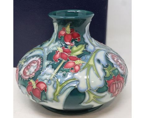 Green ground Moorcroft squat vase in the Leicester pattern, signed WM to base, some crazing and small hairline crack to base,