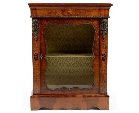 A Victorian walnut and inlaid pier cabinet , the rectangular top above a shaped and glazed panel door enclosing a single shel