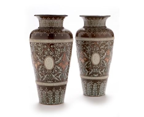 A pair of Doulton Lambeth stoneware vases, circa 1879, decorated by Edith D Lupton (c.1876-1889) with applied classical portr