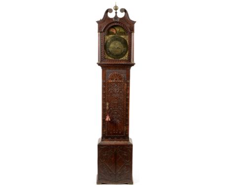 William Terry, Bedale: a later carved oak longcase clock, the arched brass dial with roman hours and arabic seconds, the date