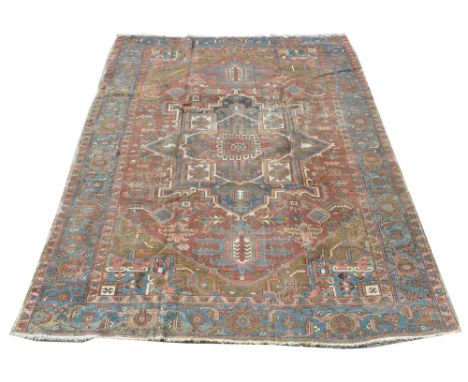 Serapi carpet, decorated with geometric floral decoration, 257 x 335cms.