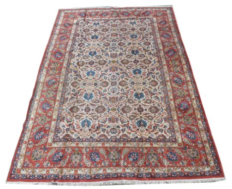 Isfahan carpet, with floral scrolls on ivory ground, 213 x 325cms.