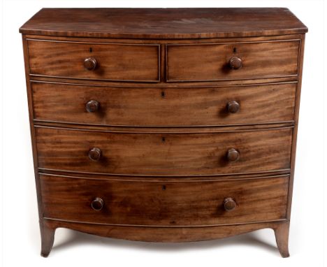 A Regency mahogany bowfront chest of drawers, the moulded top above an arrangement of two short over three long graduated doo