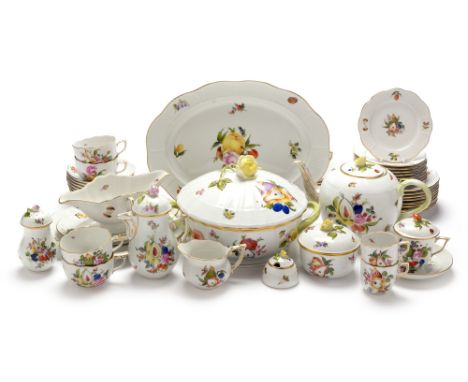 A Herend porcelain part tea, coffee and dinner service, each piece painted with floral and fruit sprays and sprigs, within ba