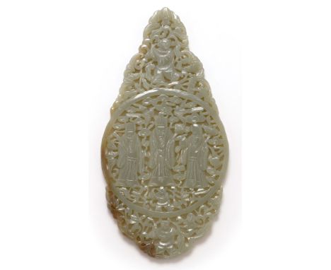 A pale green jade plaque carved with three immortals, boys and birds on a foliate scroll pierced ground, 20.5cms x 10.5cms