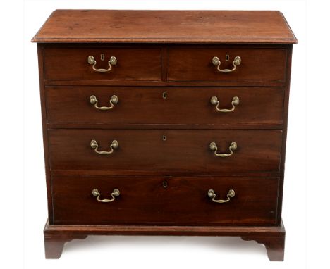 A George III mahogany chest of drawers, the rectangular moulded top above an arrangement of two short drawers over three long