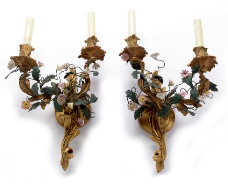 A pair of 19th Century ormolu wall mounted girandole, converted to electricity, each having beaded roundel wall mounts (assoc