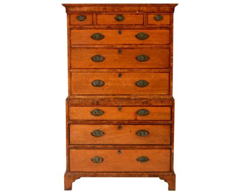 A George III mahogany and rosewood crossbanded chest on chest , the top section with cavetto moulded cornice above an arrange