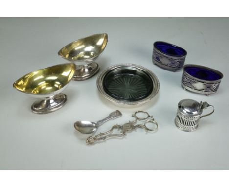 A silver coaster, Birmingham, together with a collection of silver salts and pepperettes, plated wares, a Victorian silver mu