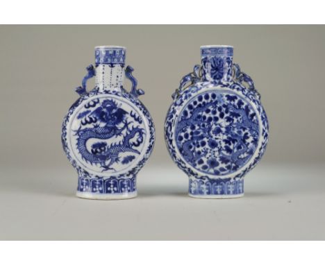 Two Chinese blue and white moon flasks19th CenturyThe first with twin chilong handles, decorated with each side with confront