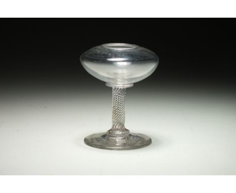 A George III glass lace makers lamp with squat reservoir and spiral twist stem, on splayed circular foot, 9cm high   Conditon