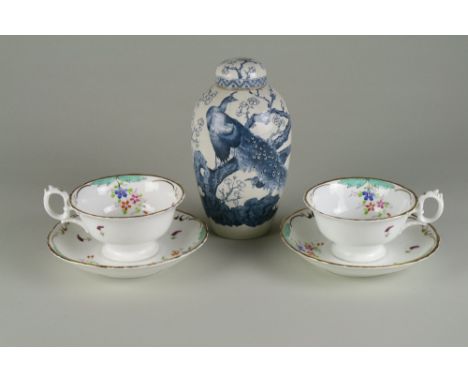 A New Hall boy in the window pattern teapot and cover, a Castleford feldspathic teapot and cover, decorated with panels of Tr