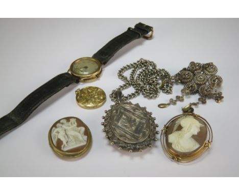 A Victorian silver locket on chain, together with a yellow metal locket, a cameo brooch, a graduated cultured pearl necklace,