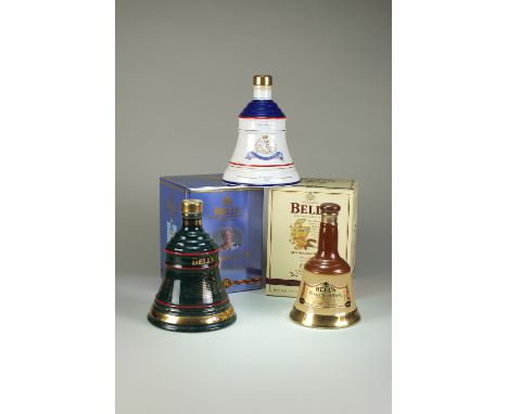 31 Bells whisky decanters, including commemorative examples and a rare miniature decanter which was not available to the publ
