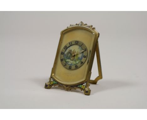 A Goldsmiths and silversmiths gilt metal and enamel strut timepiece 