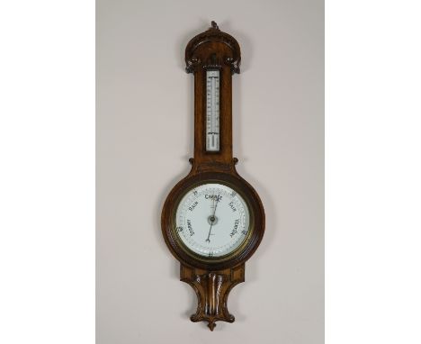 A Victorian oak barometer