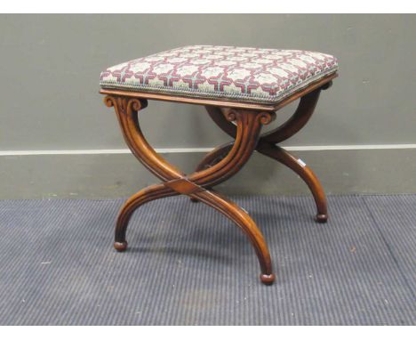 A William IV rosewood stool, with near square tapestry top, on ‘X’ frame supports and ‘acorn’ feet, 45 x 40 x 42cm