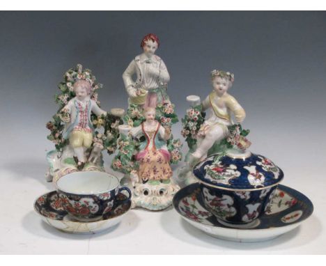 Worcester seal-marked bowl, cover, dish and cup and saucer (damaged), three Derby or similar porcelain bocage type figures (d