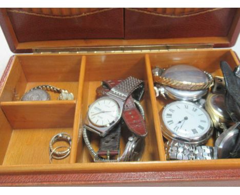 A jewellery box containing multiple watches, a hallmarked 18ct gold ring, and a ring stamped '18CT PLAT' gross weight 10.5g, 