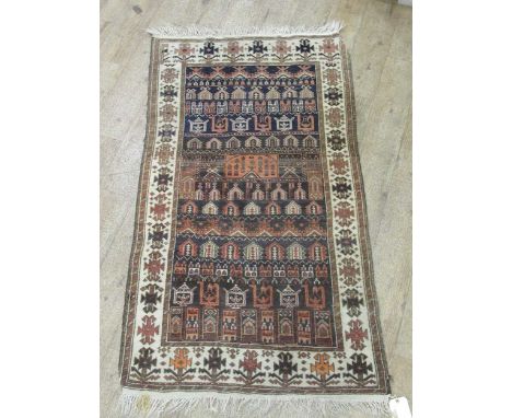 A vintage Beluchi rug, 164 x 89cm