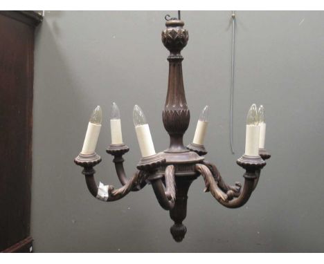 A carved wood six branch chandelier approx 72cm high, together with four composite wood effect single branch wall lights (5)