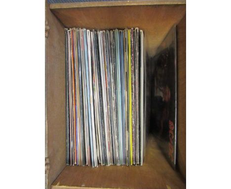 A Colombia Grafonola record player, with a classical string guitar and a record collection to include artists such as Deep Pu
